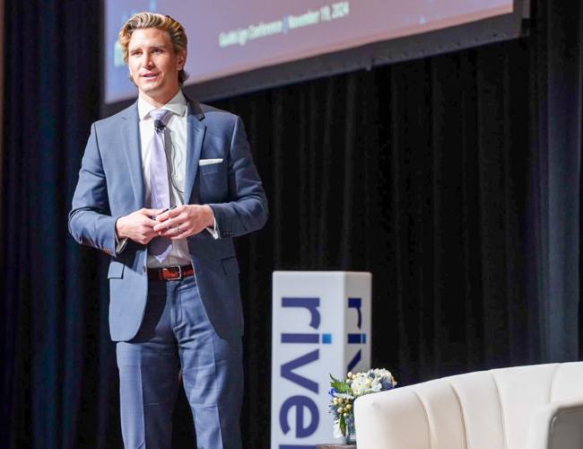 Sean McCurdy speaks at a Rivel event